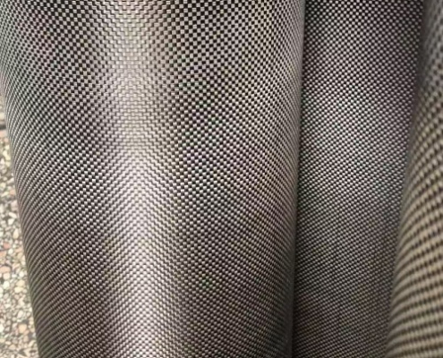 A picture of 3K plain weave fabric. A picture of 3K plain weave fabric.